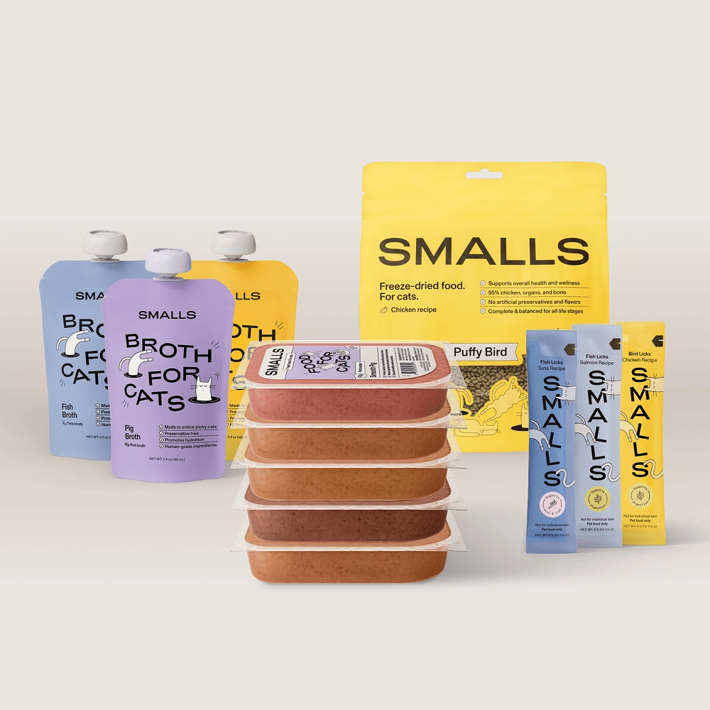 Smalls pouches and trays stacked together in lilac, yellow and blue